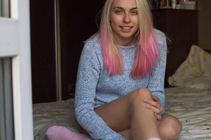 femboy sit in bed